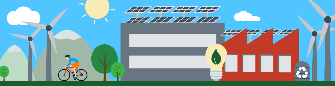bike rider passing building with solar panels and wind turbines
