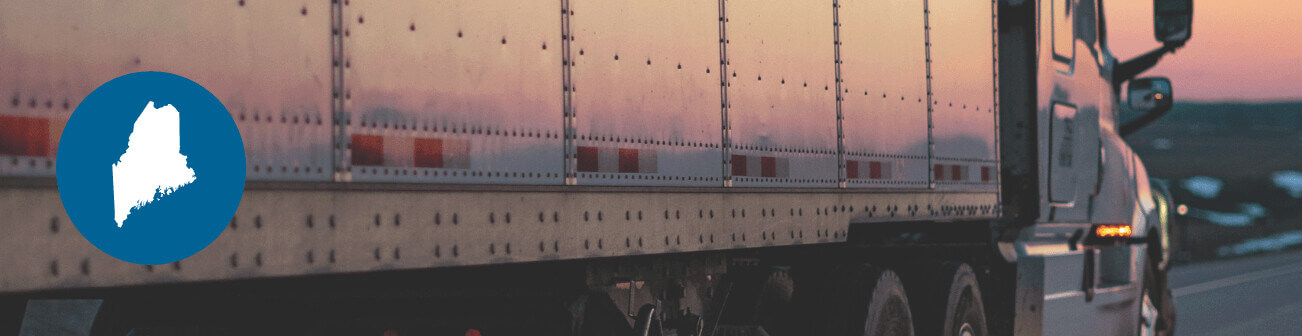 Tractor trailer on the highway at dusk