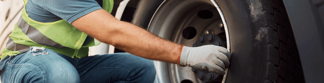mechanic fixing tire