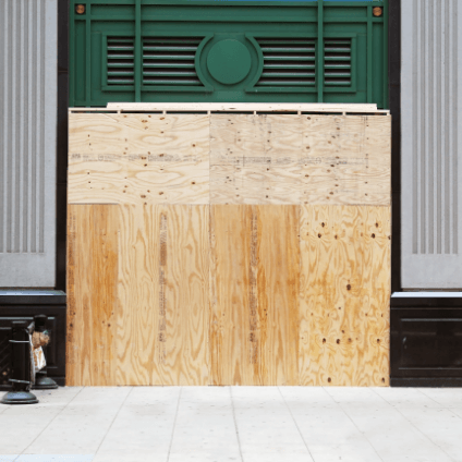 boarded up storefront