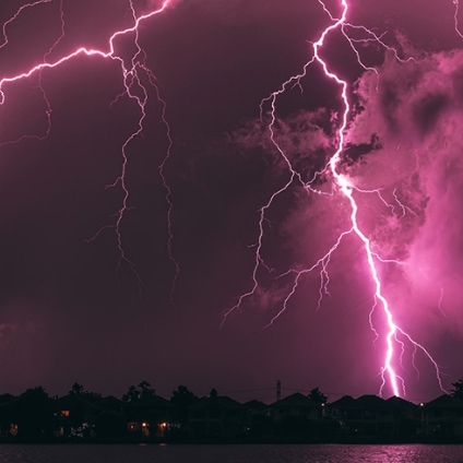 branching lightning in dark blue sky