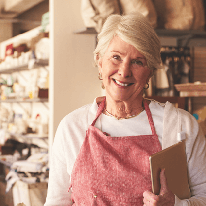 Female baker holding a notebook