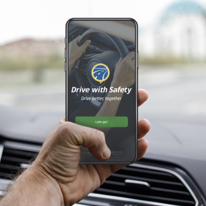 hand holding smartphone inside car